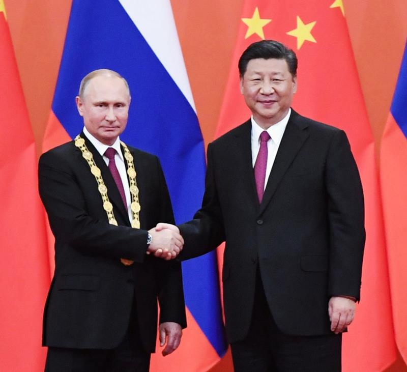 时政微观察丨从三枚勋章展望习主席俄罗斯之行